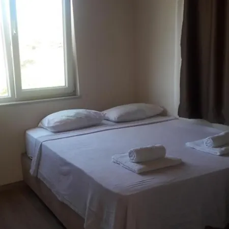 Camlaraltipansiyon Rum i privatbostad Ayvalı